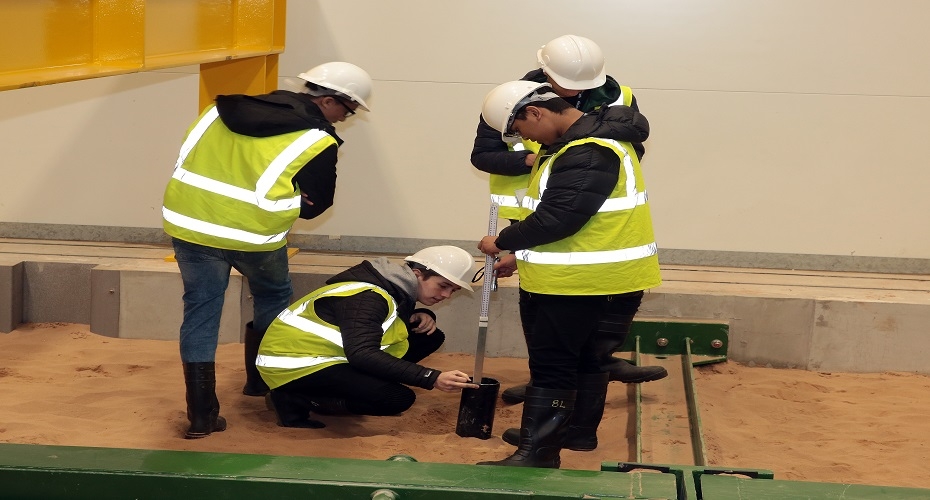  Students participating in an engineering experiment at ICAIR  Sheffield students visit state-of-the-art research facility for engineering experiments